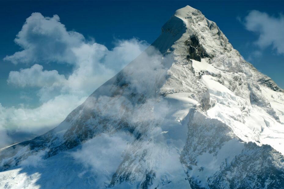 snow covered mountain under blue sky